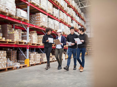 CET team tours warehouse facility