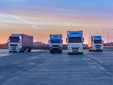 Trucks in a parking lot Trucks in a parking lot