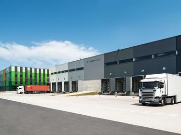Prologis Warehouse with trucks at dock doors