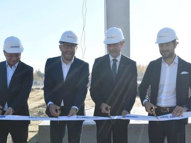 Four men on construction field
