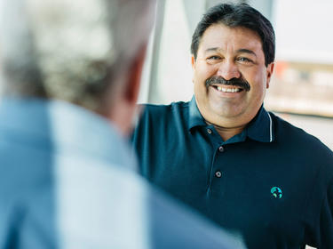 Prologis employee David Huajardo wearing Prologis polo shirt at the Oakland Global Logistics Center in Oakland, California