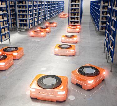 Orange robot carriers in modern warehouse, 3D rendered image