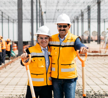 Two colleagues break ground at a  Prologis park