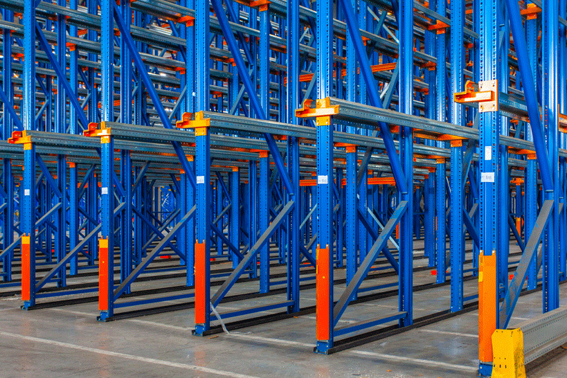 essentials-operations-left.jpg Empty warehouse racking