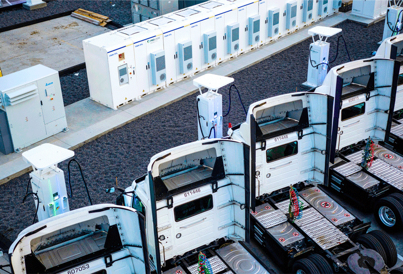 Electric semi-trucks charging at a Prologis warehouse Electric semi-trucks charging at a Prologis warehouse
